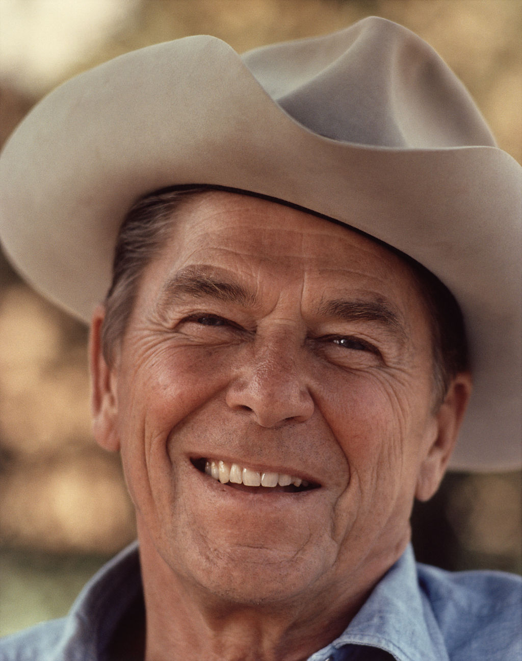 1024px-Ronald_Reagan_with_cowboy_hat_12-0071M_edit.jpg