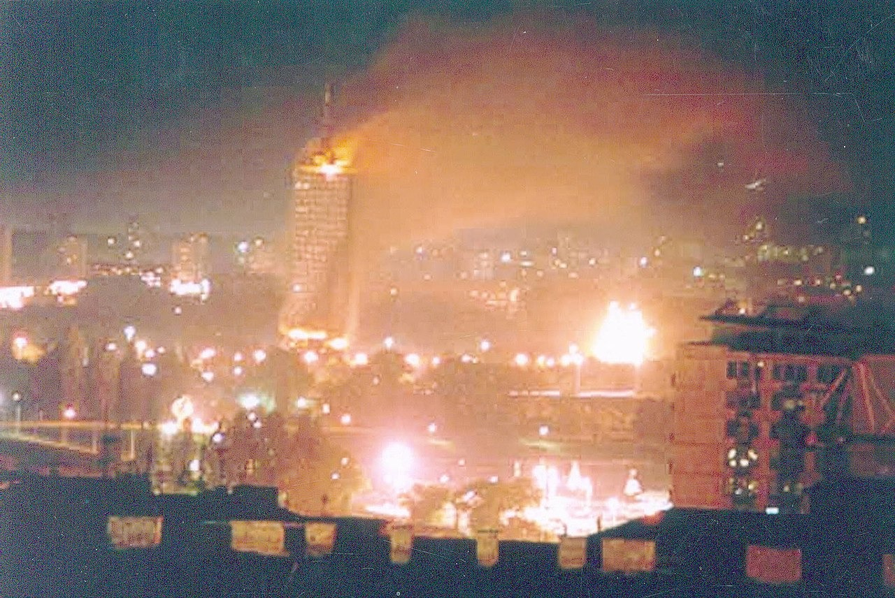 1280px-Belgrade_durnig_NATO_bomb.jpg