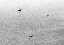 220px-MiG-15s_curving_to_attack_B-29s_over_Korea_c1951.jpg