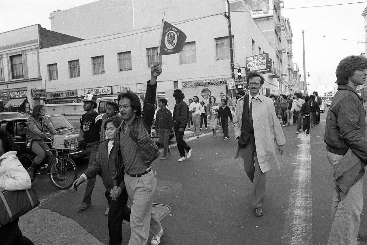 49ers fans celebrating march toward SF City Hall.jpg