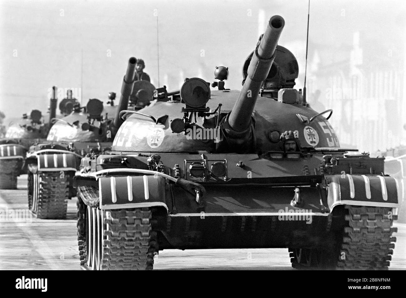 afghan-soldiers-ride-a-soviet-made-t-62-main-battle-tank-during-a-military-parade-to-mark-the-...jpg