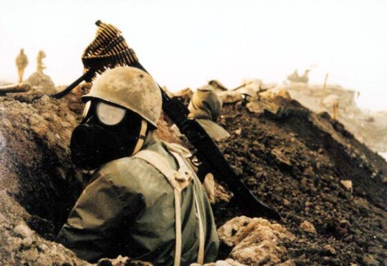 Iranian-soldier-wearing-gas-mask-during-Iran-Iraq-War-photo-via-Wikipedia-e1606371935891.jpg