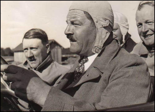 Julius Schreck driving Hitler 1933.jpg