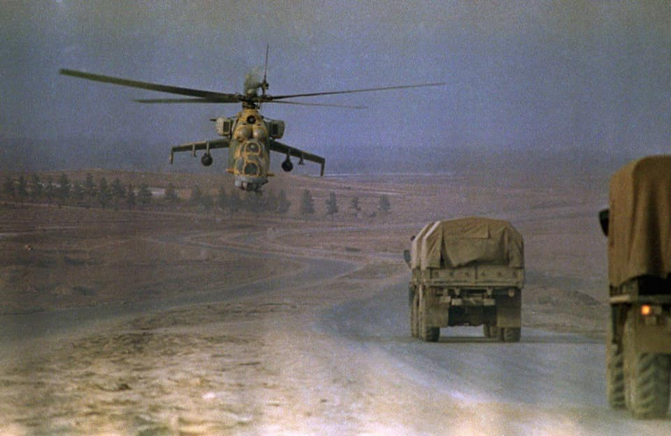Mi-24 and convoy.jpg