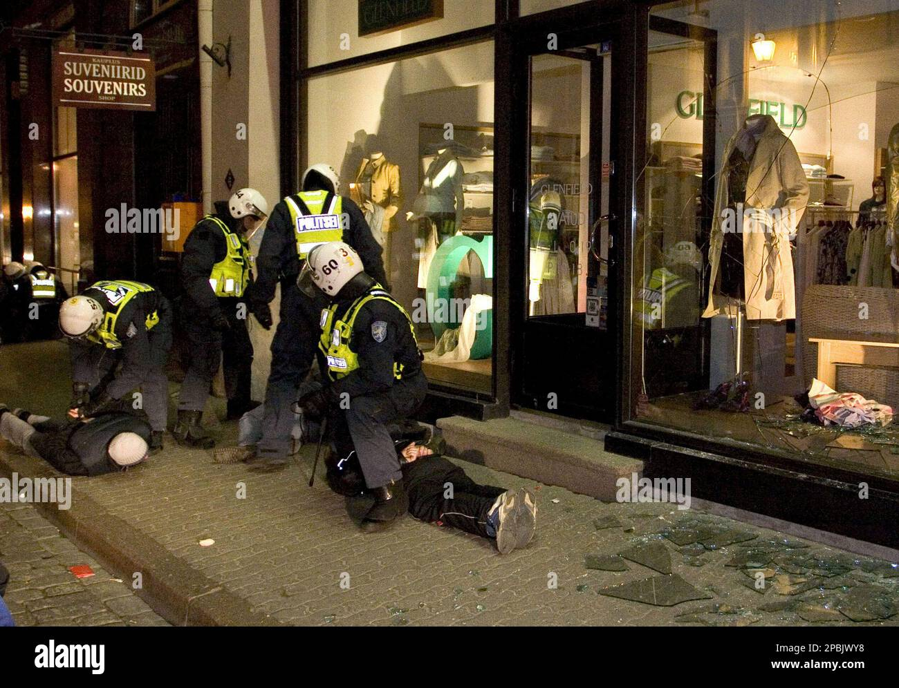 police-officers-in-riot-gear-detain-looters-in-central-tallinn-during-the-second-night-of-riot...jpg