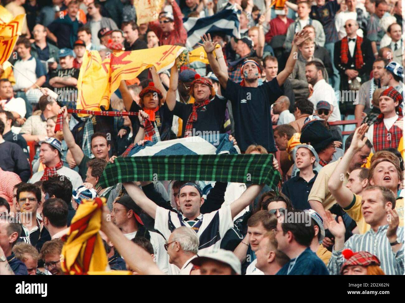 scotland-fans-celebrate-their-euro-96-0-0-draw-with-holland-after-todays-monday-match-at-villa...jpg