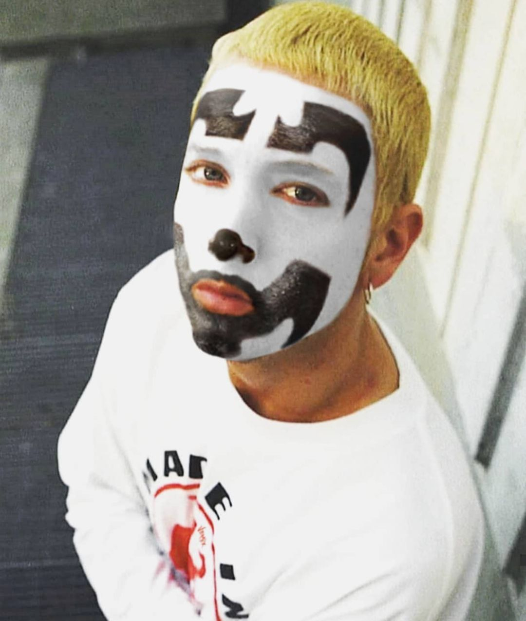 sporting the make-up of fellow Detroit rappers, The ICP, after Violent J an...