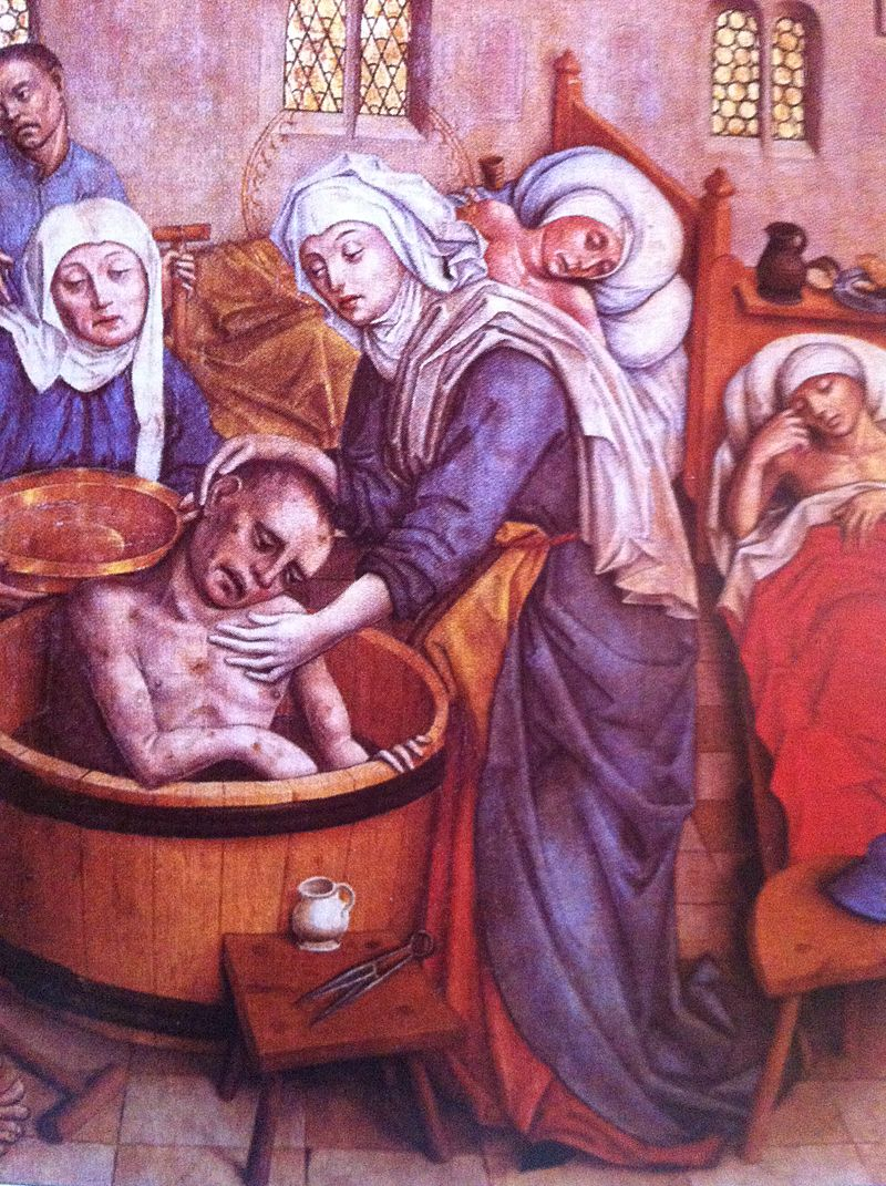 St Elizabeth of Hungary washing a sick man.jpg