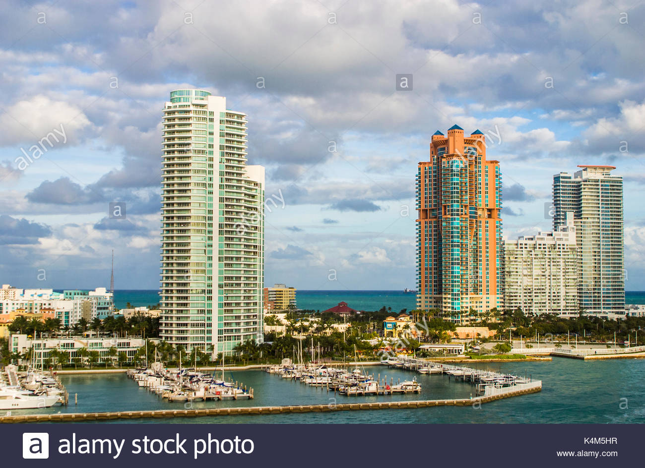 tall-coastal-modern-high-rise-waterfront-apartment-blocks-and-holiday-K4M5HR.jpg