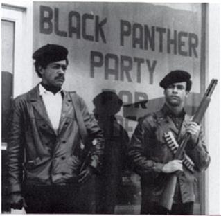 Black-Panther-Party-armed-guards-in-street-shotguns.jpg