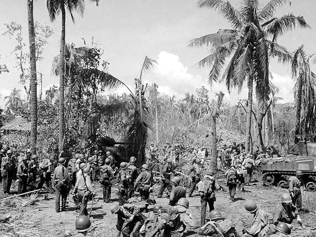 Men_and_equipment_on_Leyte_beachhead.jpg