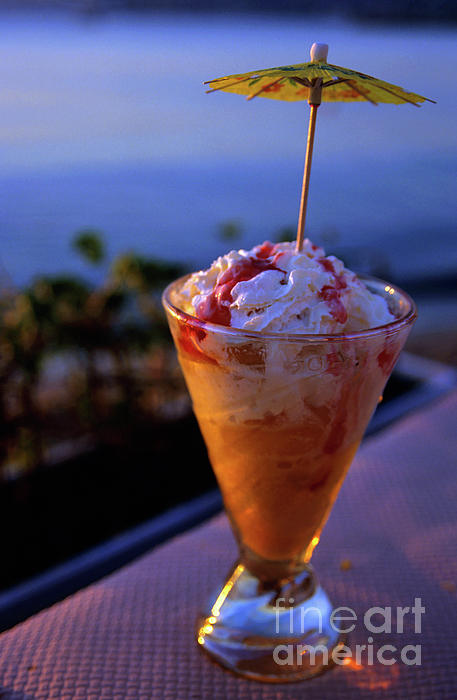 peach-ice-cream-sundae-served-with-a-cocktail-umbrella-in-a-glass-sami-sarkis.jpg