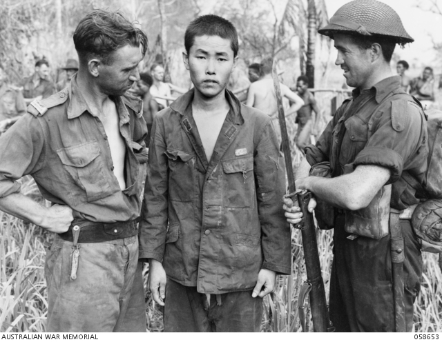 Australian_soldiers_Japanese_POW_Oct_1945.jpg
